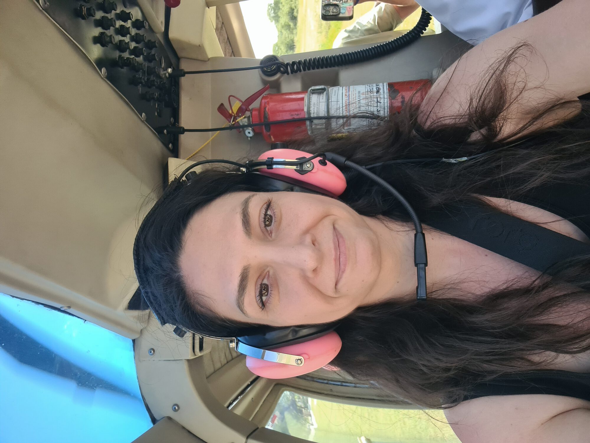 Kelly in the cockpit of a microlight aircraft over the Zambezi basin